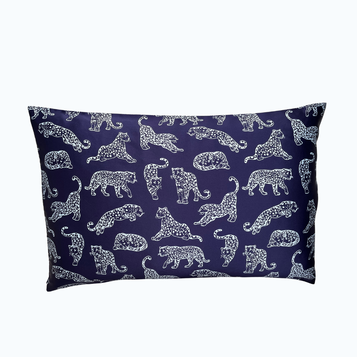 Dark blue leopard printed silk pillowcase on a white background