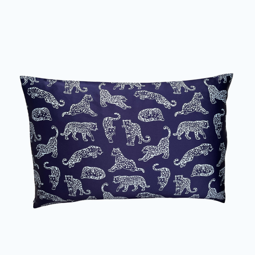 Dark blue leopard printed silk pillowcase on a white background