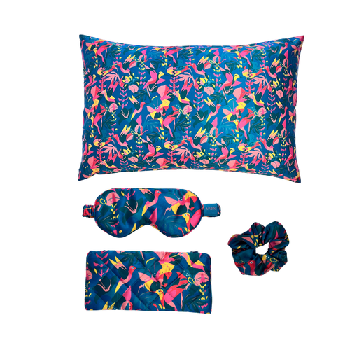 Hummingbird printed silk pillowcase, eye mask and scrunchie on a white background