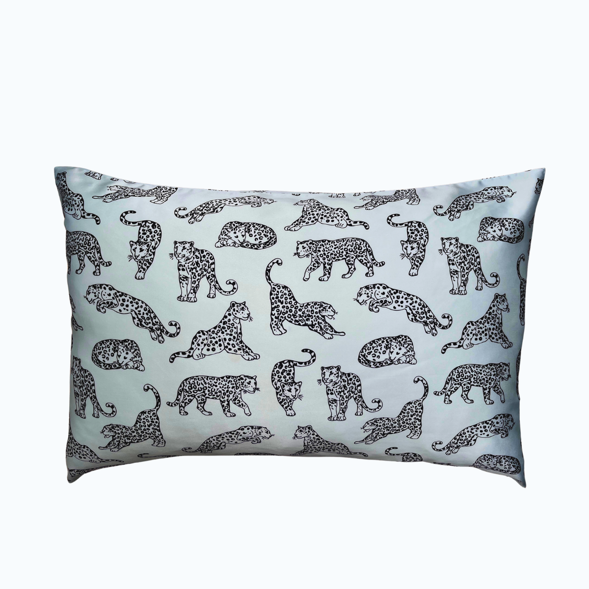 Light blue leopard printed silk pillowcase on a white background