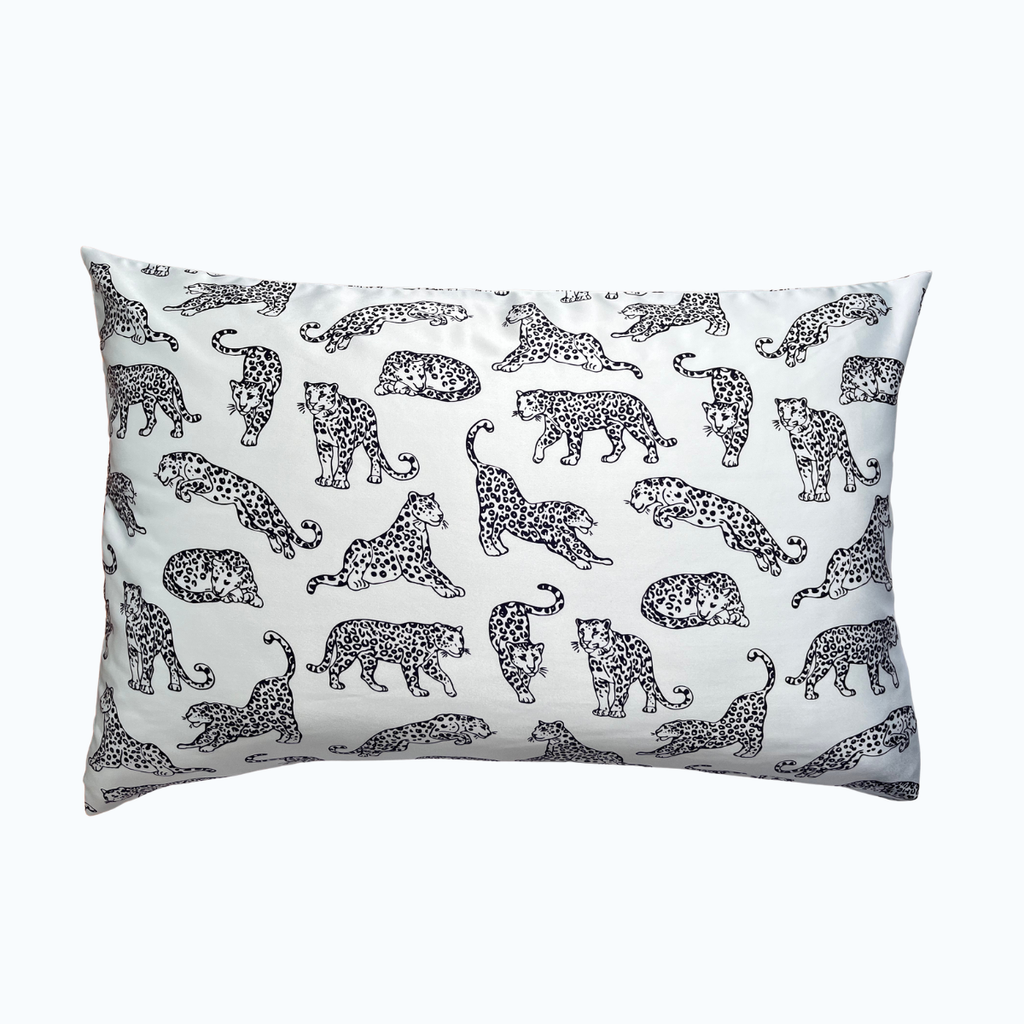 MYRN Blue Leopard printed silk pillowcase on a wite background.