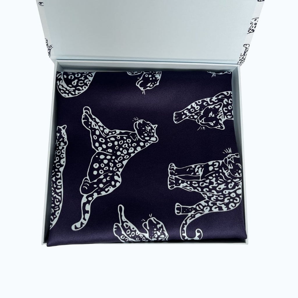 MYRN Midnight Blue leopard printed silk pillowcase in a presentation box on a white background