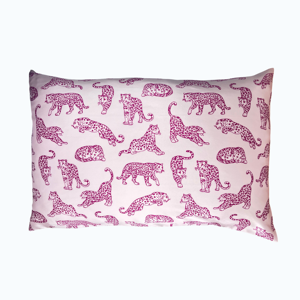 Pink Leopard Printed silk pillowcase on a wite background.