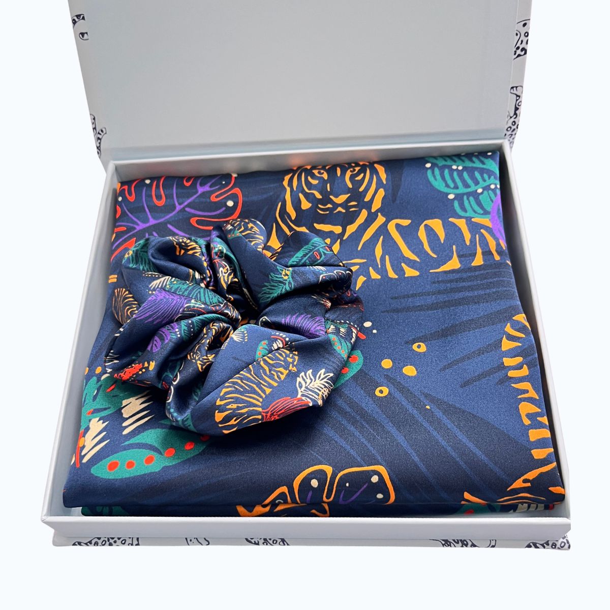 MYRN Silk Tiger Print silk pillowcase and large silk scrunchie in a presentation box on a white background